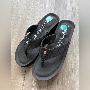 Calvin Klein Black Logo Thong Sandals with Teal Insole Accents